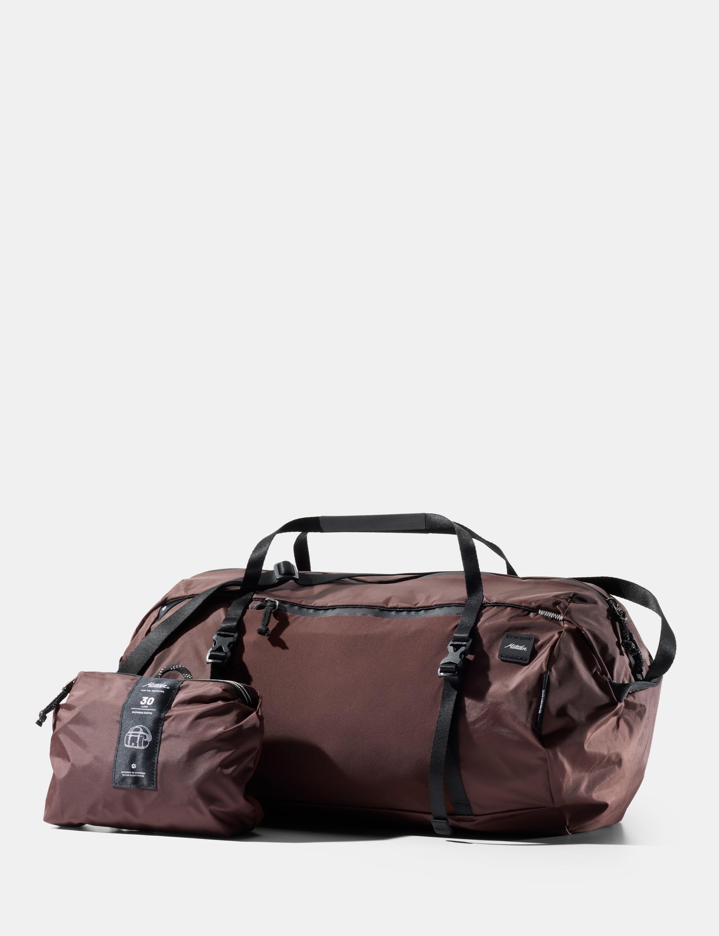 duffel bag, gym bag, travel bag, brown, pocketed